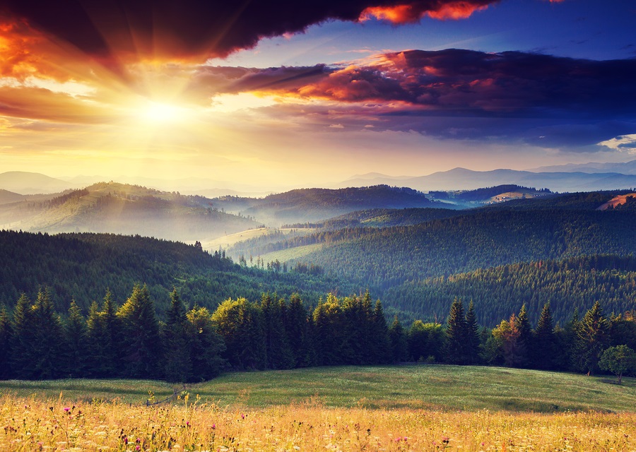 Majestic sunset in the mountains landscape. Dramatic sky. Carpat